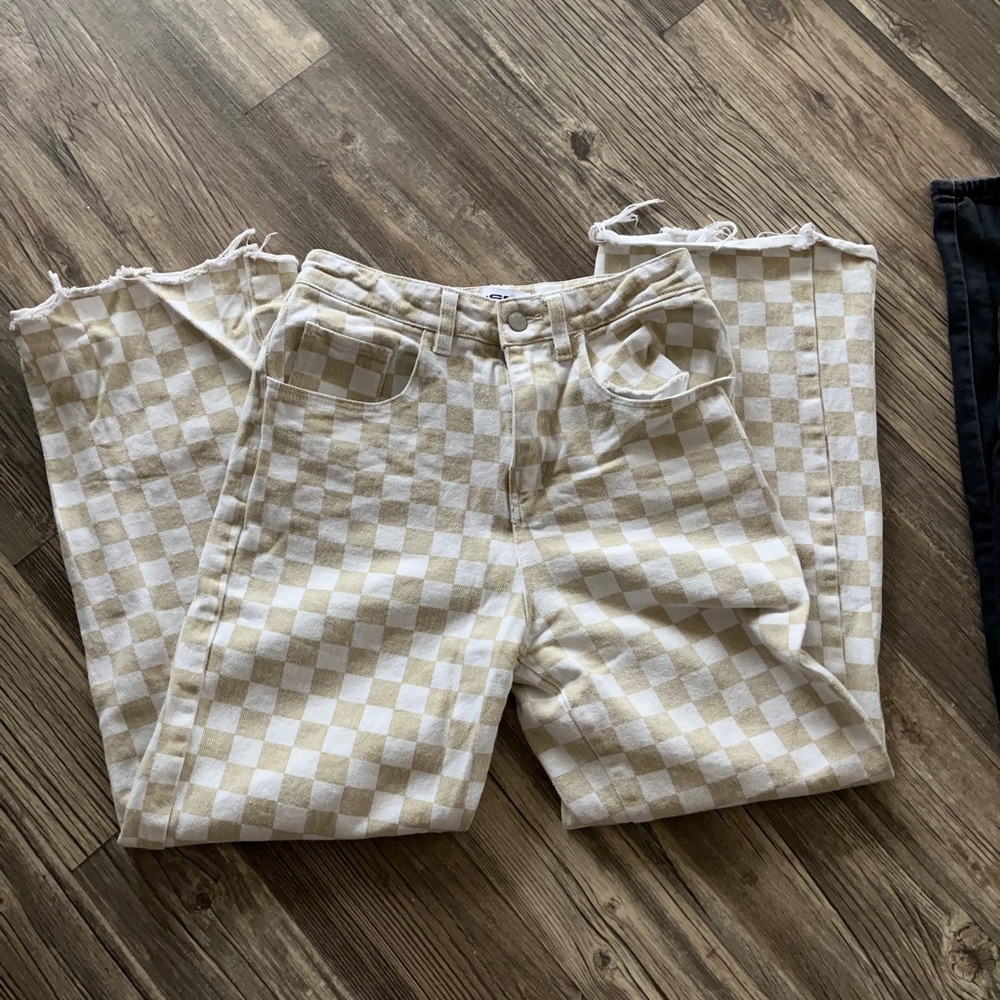 Checkerboard Pacsun jeans.